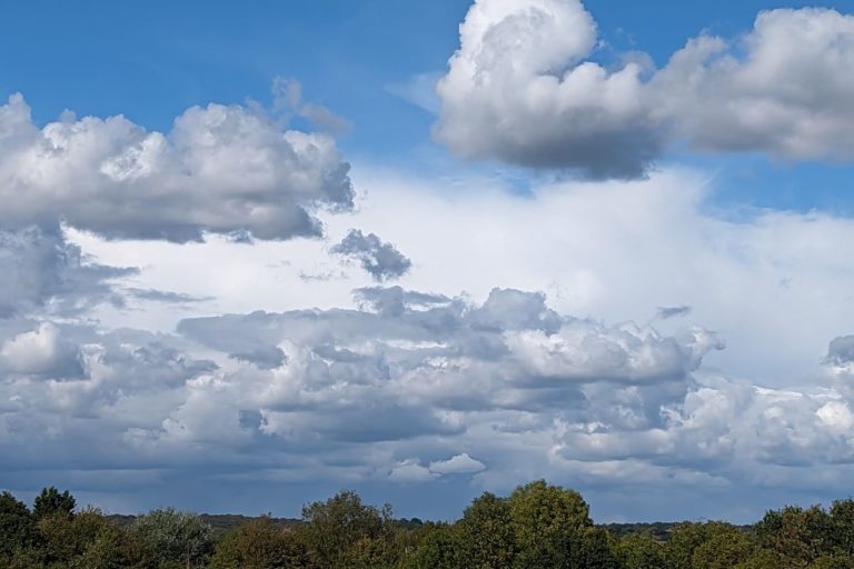Dark massing clouds of cumulonimbus indicate an approaching thunderstorm near Epping